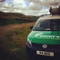 Woody’s pest control services logo