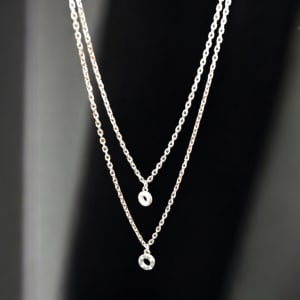 Celeste Harmony – Dual Halo Pendant Layered Chain
