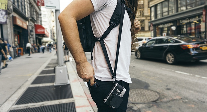 Our integrated camera sling keeps your camera right at your fingertips. With all of the weight off your neck, it's much more comfortable than a neck strap.