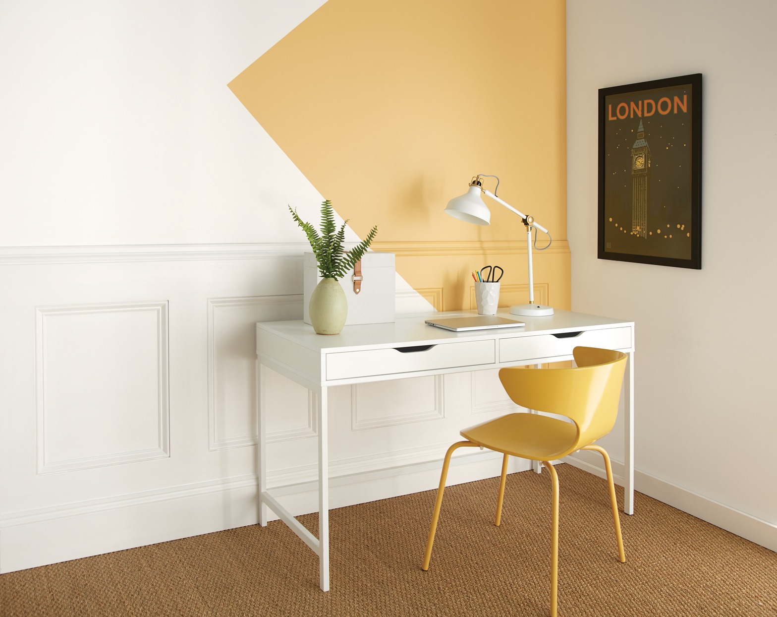 A splash of yellor for a mini home office | Source: marthastewart.com