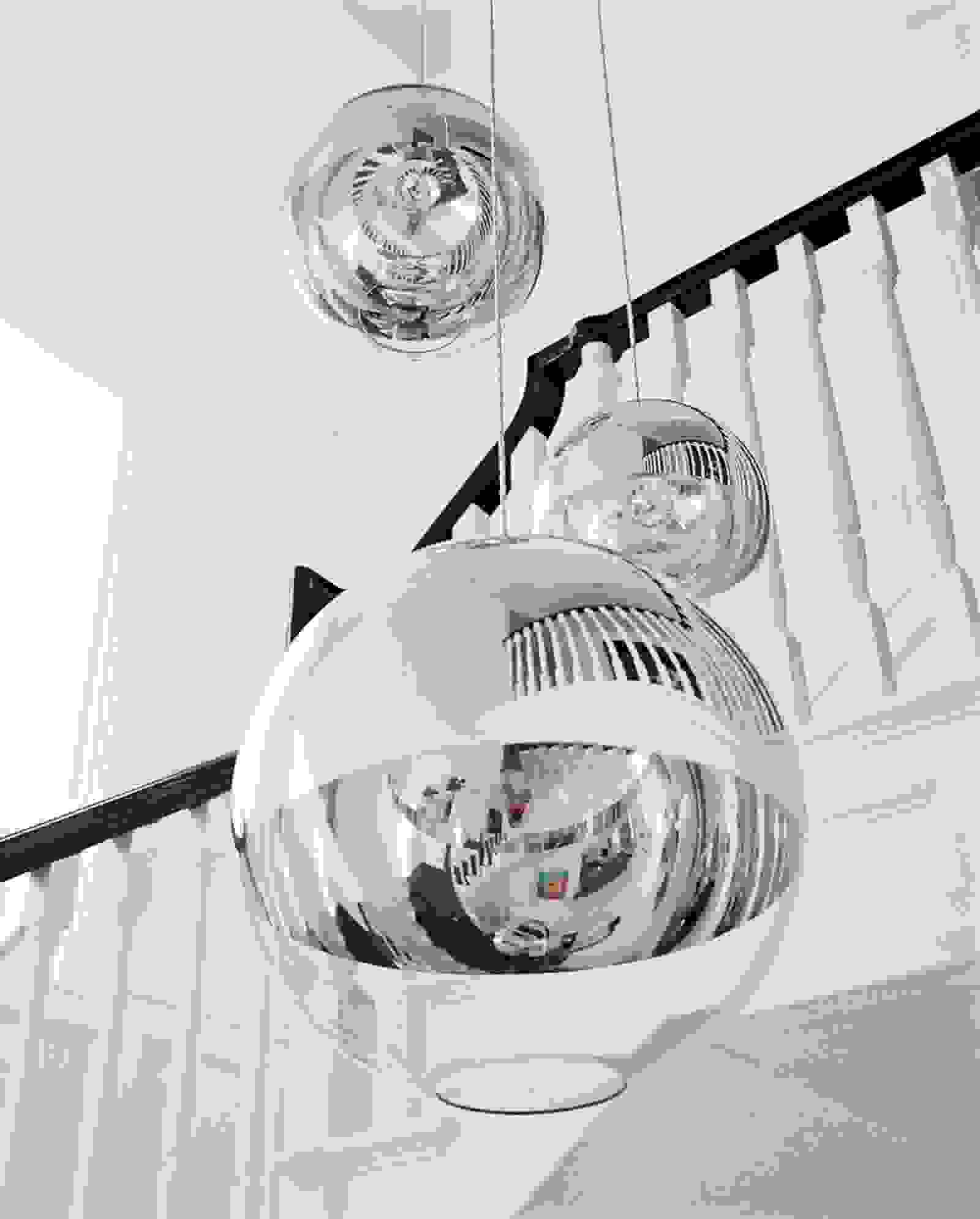Futuristic orb chandelier by Tom Dixon | Source: vogue.com