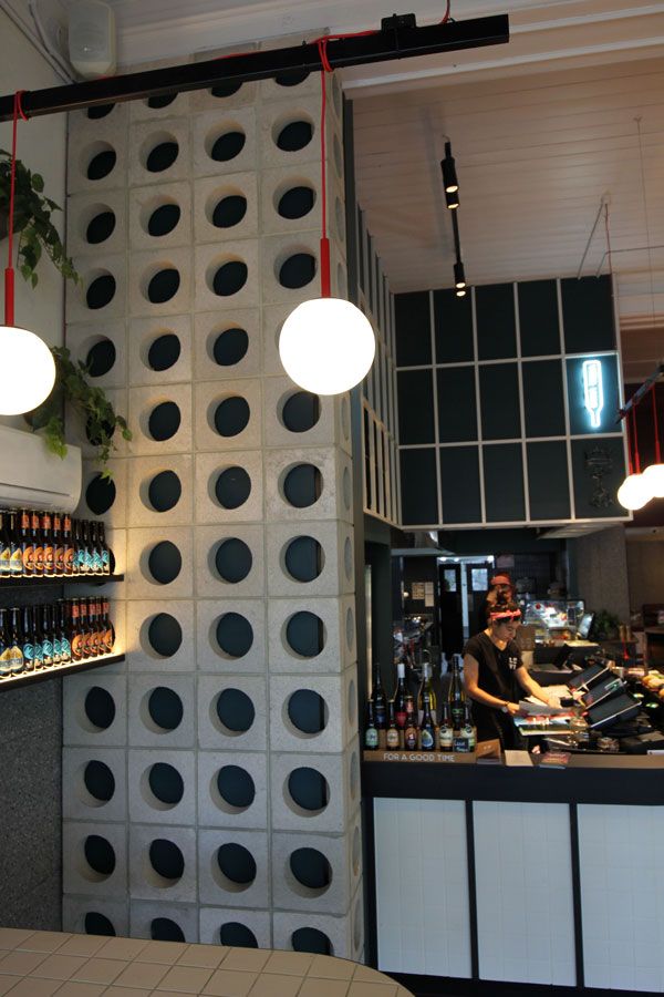 The implementation of minimalist $breeze$ $block$ on the facade of modern house architecture provides optimal ventilation and creates an aesthetically pleasing decorative roster.