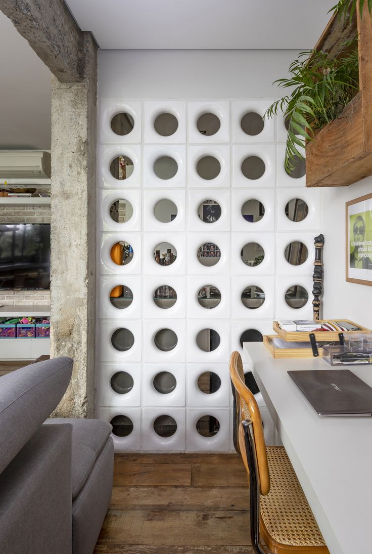 The implementation of minimalist $breeze$ $block$ on the facade of modern house architecture provides optimal ventilation and creates an aesthetically pleasing decorative roster.