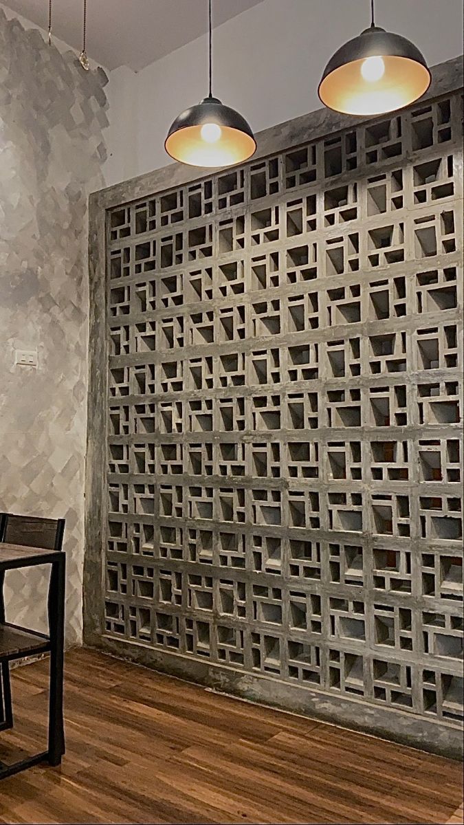 The implementation of minimalist $breeze$ $block$ on the facade of modern house architecture provides optimal ventilation and creates an aesthetically pleasing decorative roster.