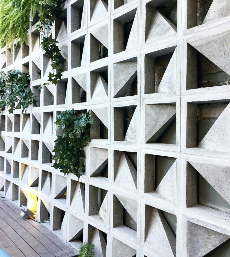 The implementation of minimalist $breeze$ $block$ on the facade of modern house architecture provides optimal ventilation and creates an aesthetically pleasing decorative roster.