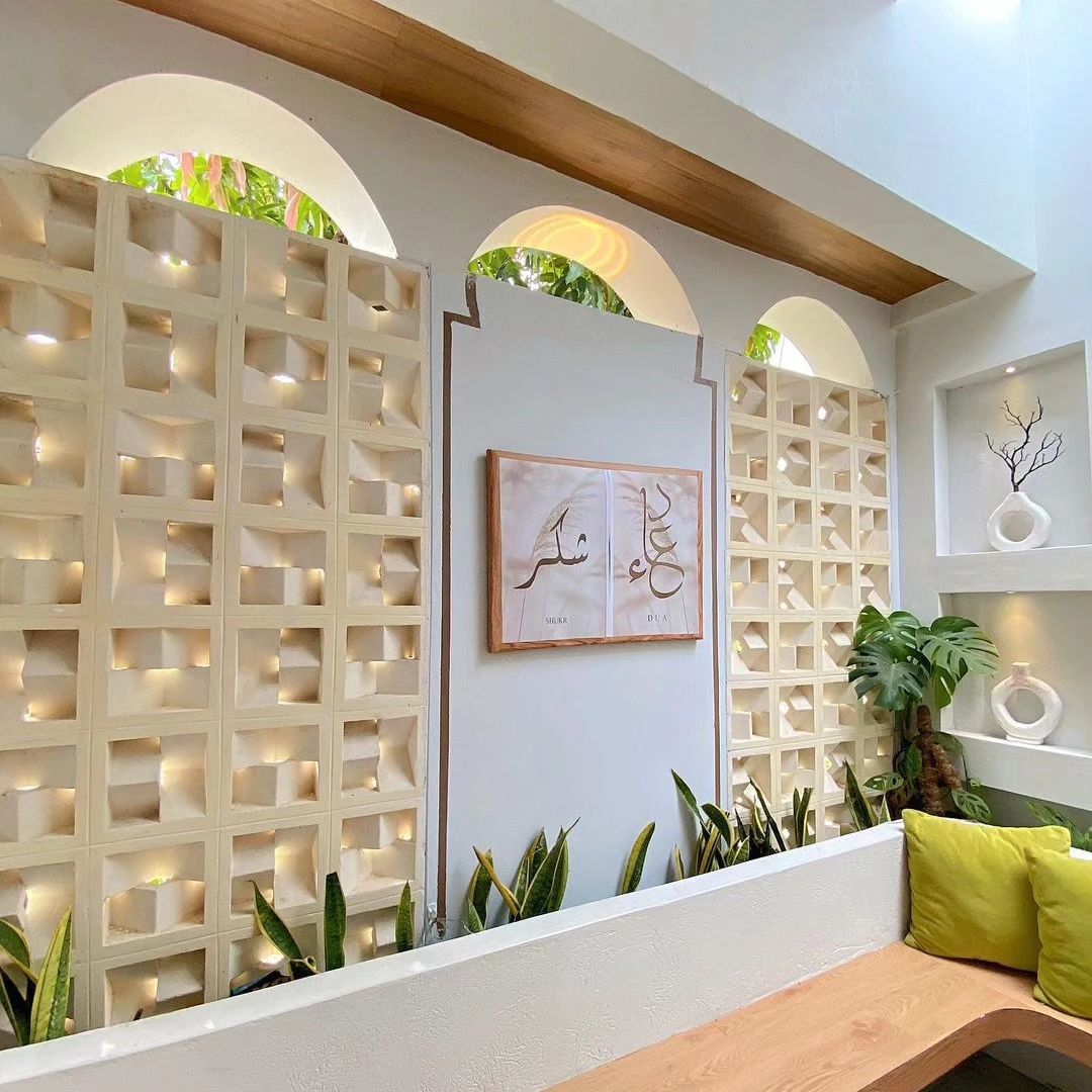 The implementation of minimalist $breeze$ $block$ on the facade of modern house architecture provides optimal ventilation and creates an aesthetically pleasing decorative roster.