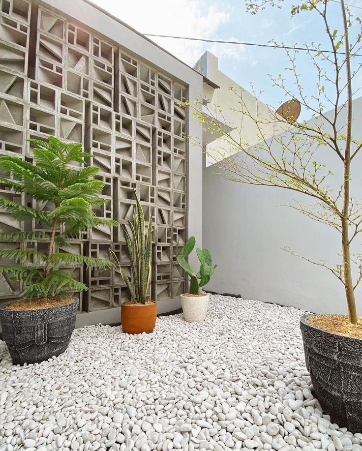 The implementation of minimalist $breeze$ $block$ on the facade of modern house architecture provides optimal ventilation and creates an aesthetically pleasing decorative roster.