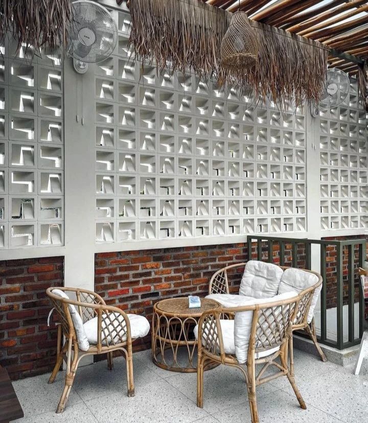 The implementation of minimalist $breeze$ $block$ on the facade of modern house architecture provides optimal ventilation and creates an aesthetically pleasing decorative roster.