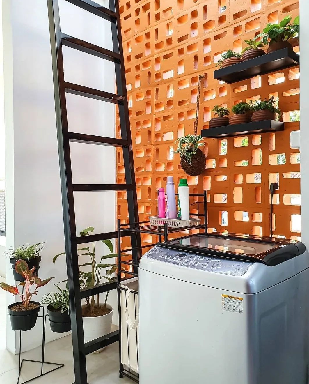 The implementation of minimalist $breeze$ $block$ on the facade of modern house architecture provides optimal ventilation and creates an aesthetically pleasing decorative roster.