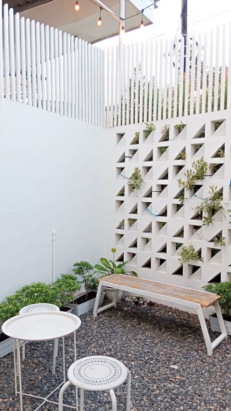 The implementation of minimalist $breeze$ $block$ on the facade of modern house architecture provides optimal ventilation and creates an aesthetically pleasing decorative roster.