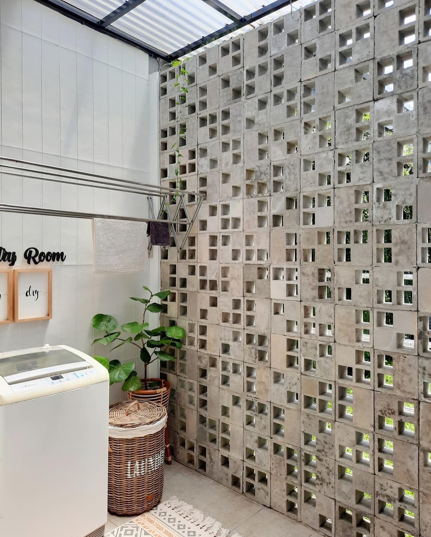 The implementation of minimalist $breeze$ $block$ on the facade of modern house architecture provides optimal ventilation and creates an aesthetically pleasing decorative roster.