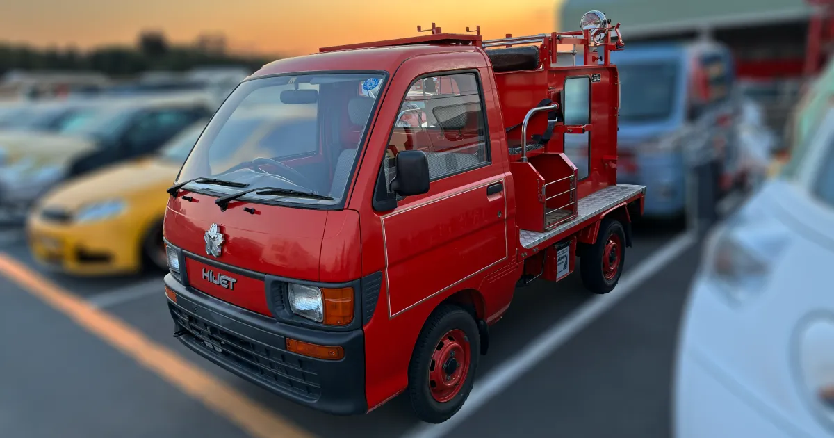 A Daihatsu Hijet mini truck once used by a real Japanese firehouse