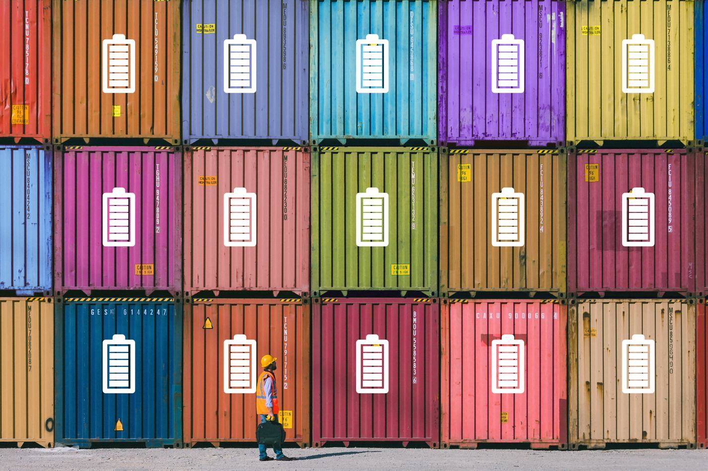 Colourful containers with battery icon on them, a worker walking