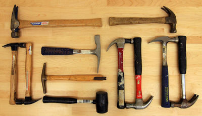 Set of many diffrerent hammers.