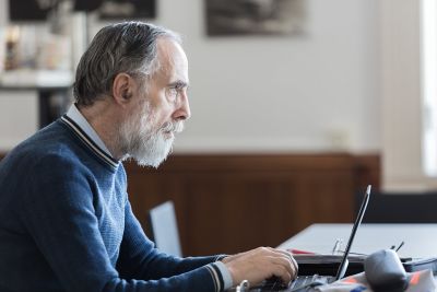 Older man using computer