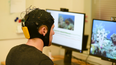 An EEG measurement device designed similar to a swim cap