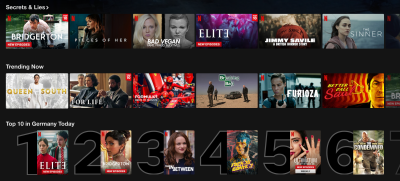 A screenshot of the movies presented on the Netflix website in April 2022 with three horizontal carousels