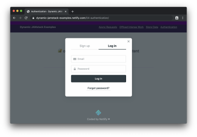 A modal window showing sign up and login tabs with a login form displayed
