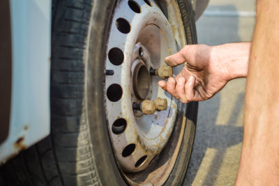 A lug nut in a wheel