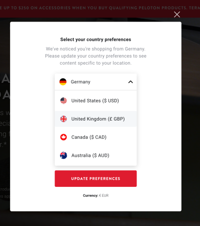 Peloton provides a choice for country preferences in a modal upon website entry.