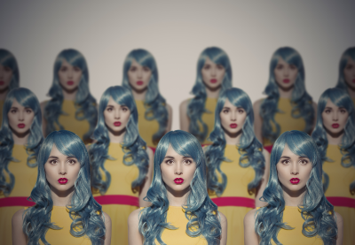 Three rows of multiple clones of a woman wearing a yellow dress with a red waist sash and long blue hair; an identical crowd concept