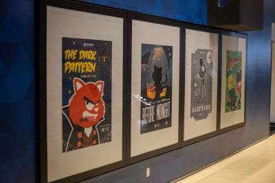 Photo of movie-style posters featuring the Smashing Cat