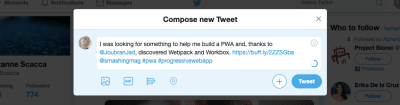 Twitter message with hashtags and handles