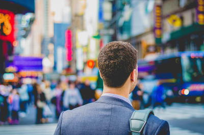 'At the bustling Times Square' by Saulo Mohana on Unsplash