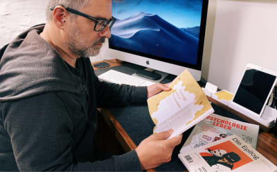  Andy Clarke reading Pressing Matters magazine