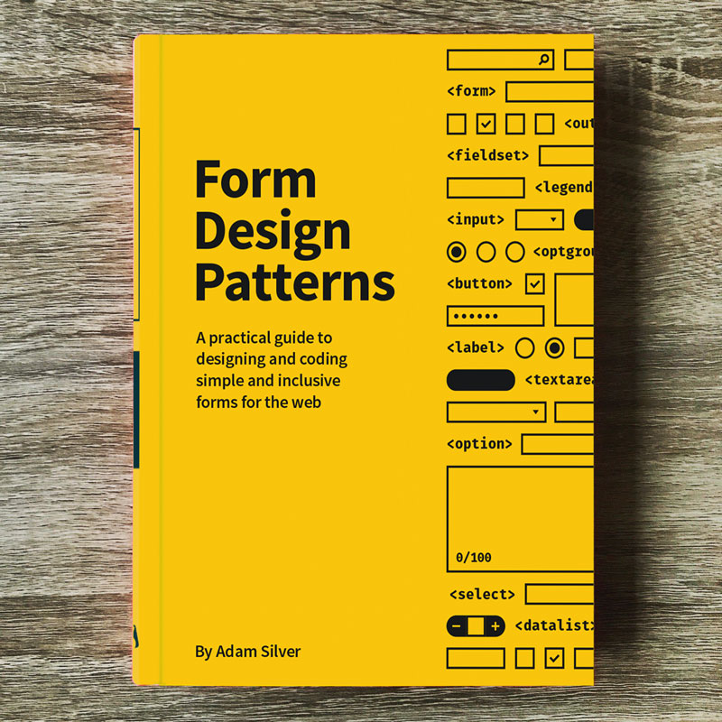 The Form Design Patterns book is a hardcover book with a yellow cover and black text on it