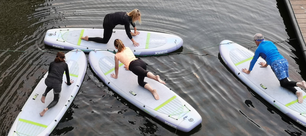 paddleboarding yoga