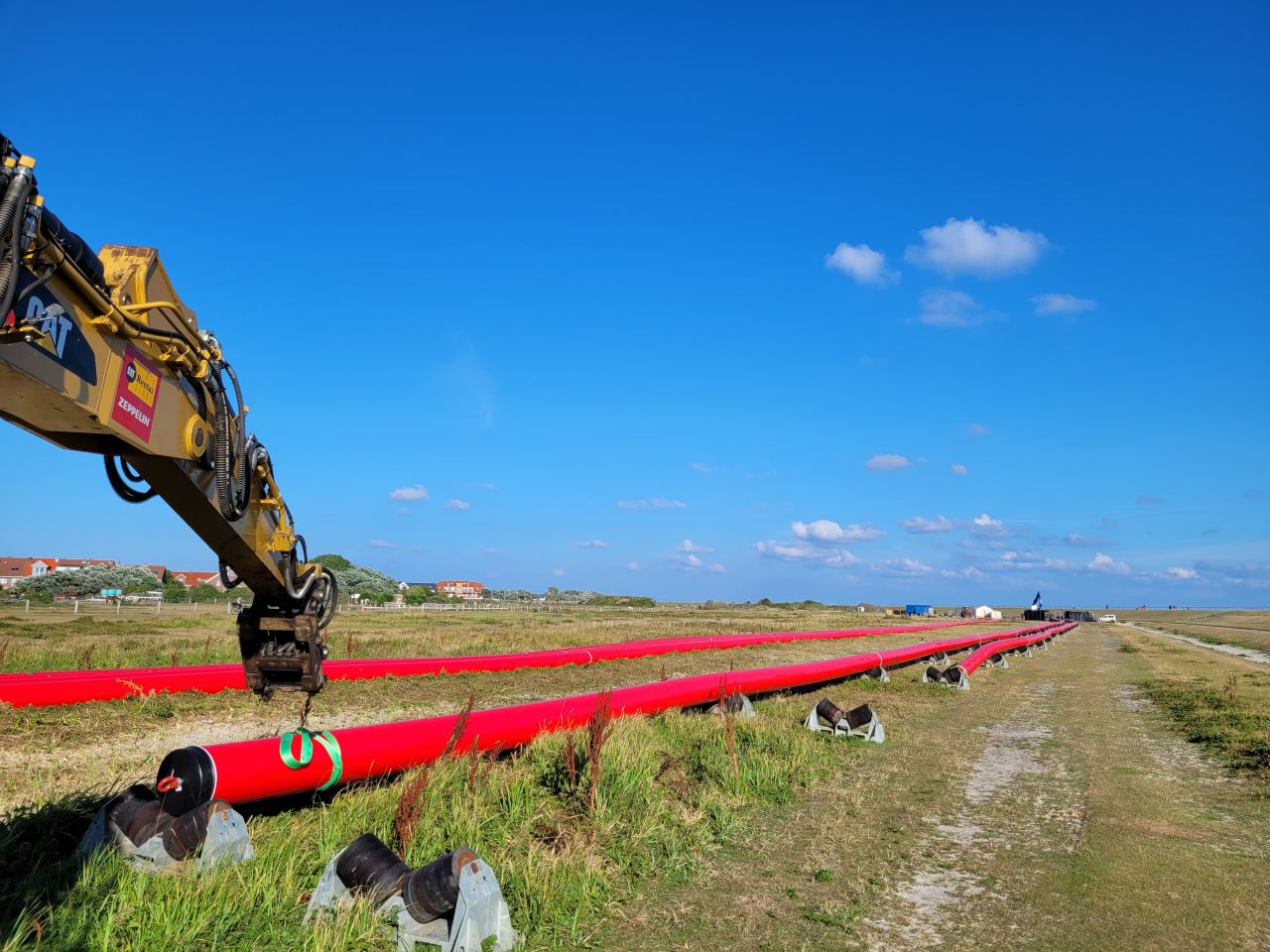 Protective ducts being laid for underground energy cables.jpg