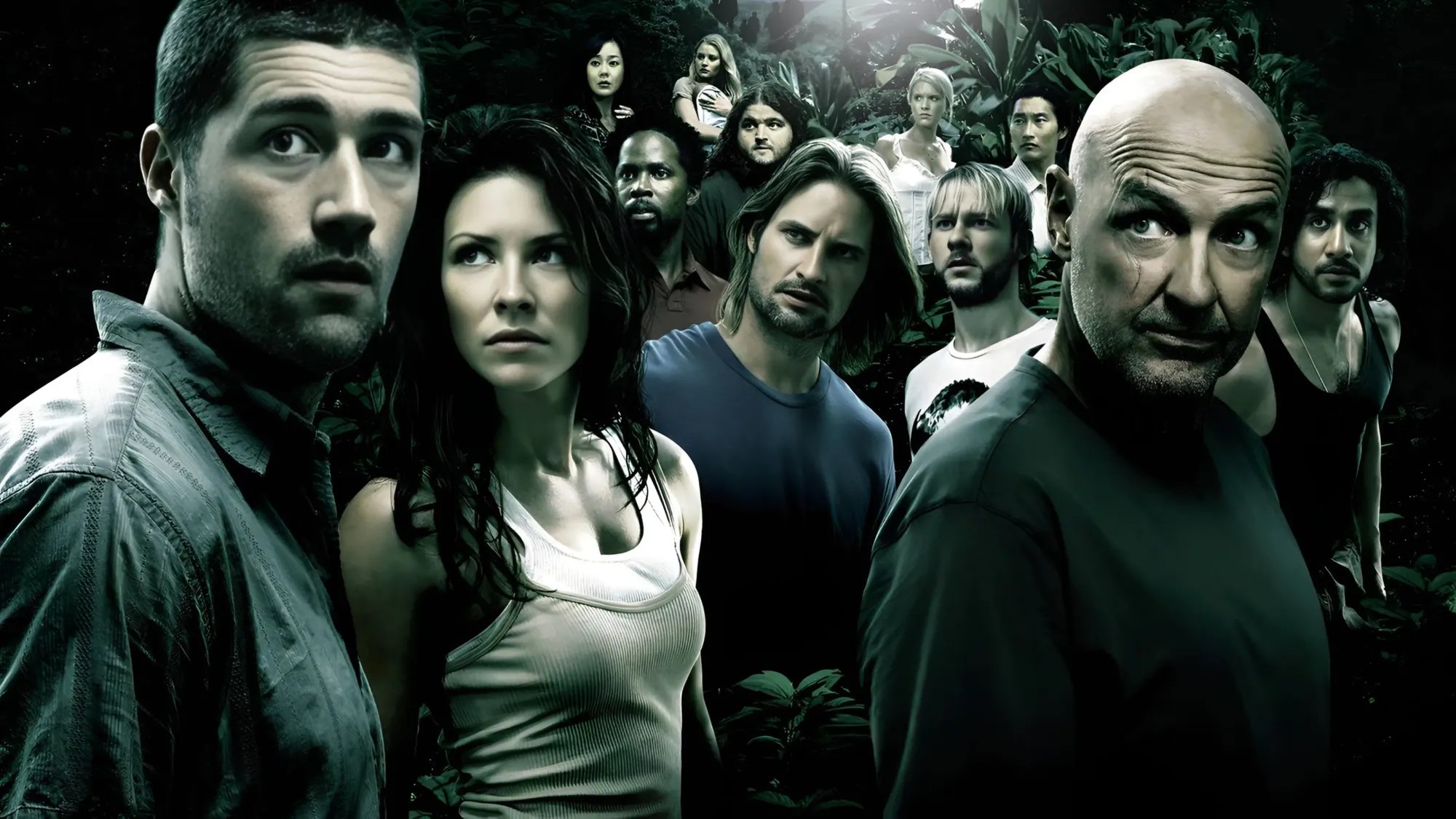 The survivors of Oceanic 815 gathered in dense jungle at night, Jack and Kate in front on the left, Locke on the right, and the rest of the castaways behind them