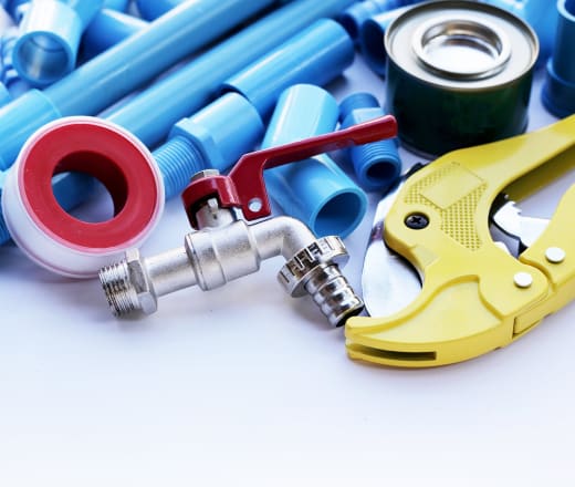 Plumbing equipment with blue PVC piping connections