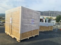 The interior of a crate showing sensitive high-tech electronics packed with anti-static foam and specialized materials by Infinity Pack & Ship.