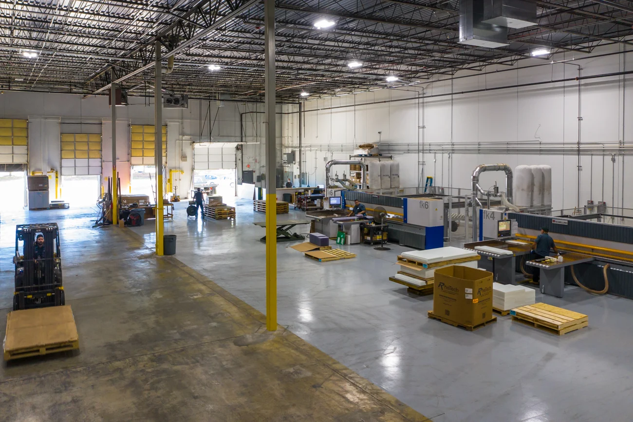 Professional CNC routing and precision machining of custom plastic parts at Laird Plastics facility