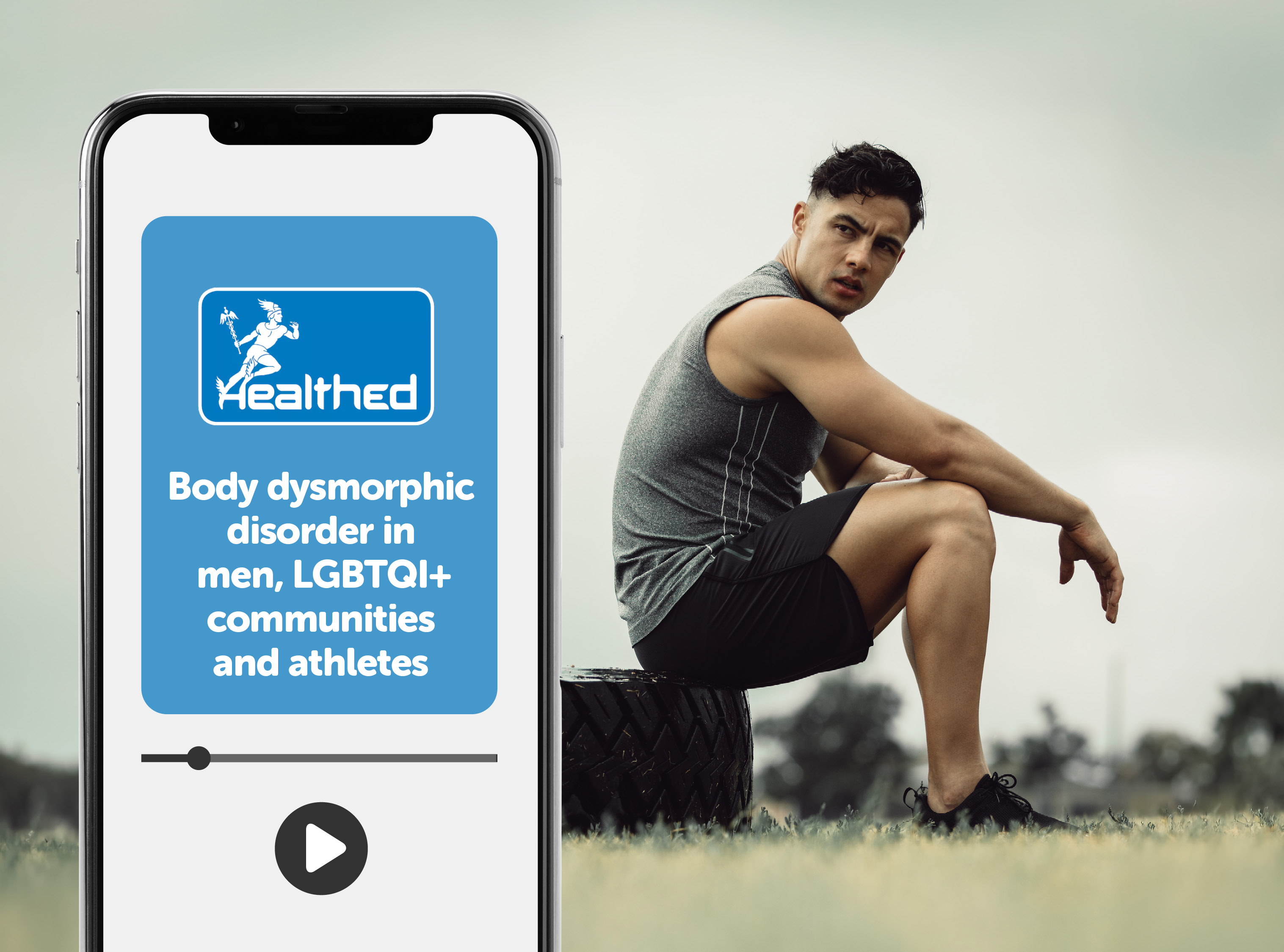 Smartphone displaying a Healthed educational video titled “Body dysmorphic disorder in men, LGBTQI+ communities and athletes.” A video progress bar and play button appear on the phone screen. In the background, a person in athletic clothing sits outdoors on a large tyre in a grassy field.