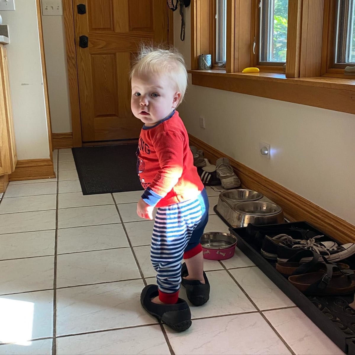 Going for a walk in his big-ass shoes