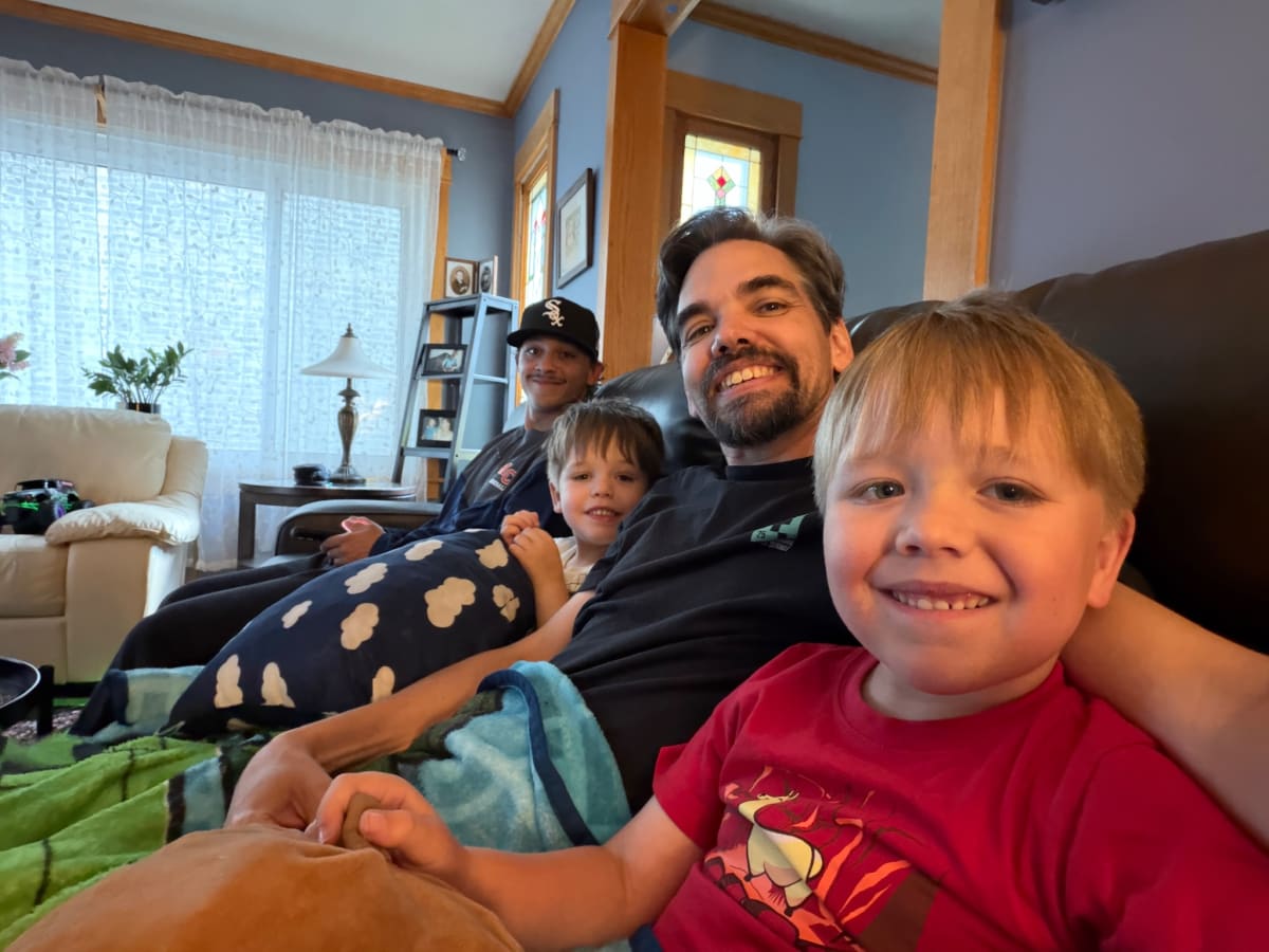 Joe, Owen, Mike and Ryan sitting on the couch