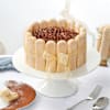 Buy Tranquil Blooms Basket With Tiramisu Cake