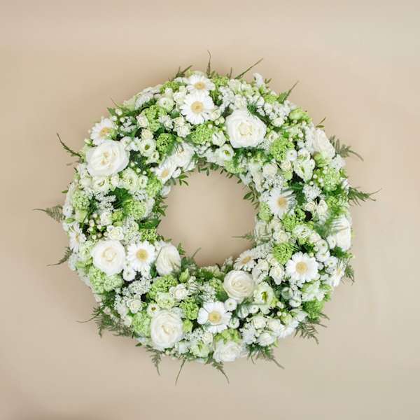 Funeral wreath with roses and gerberas