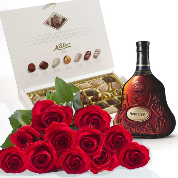 Roses, Cognac and chocolates, photo is illustrative