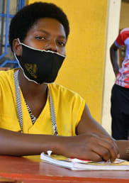 Grace at her business stand