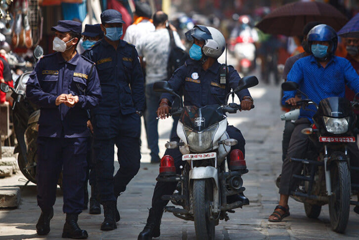 Police conduct COVID-19 inspections among shopkeepers in Nepal