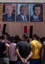 A crowd of Syrian nationals living in Lebanon gather at the Syrian Embassy in Yarze, east of Beirut, waiting to cast their votes in the country's presidential election.