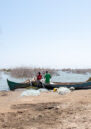 Fishermen preparing their nets before going out to fish