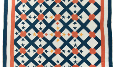 Madison Township Memorial of the World War quilt featuring red crosses, blue and yellow stars.