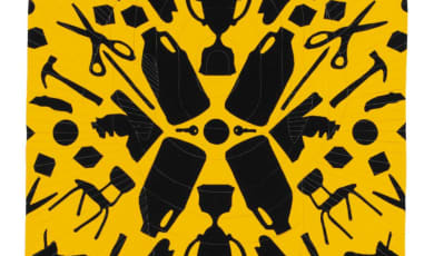 What We Will Use As Weapons: A List of School Supplies quilt photo showing school supplies on a yellow background. 
