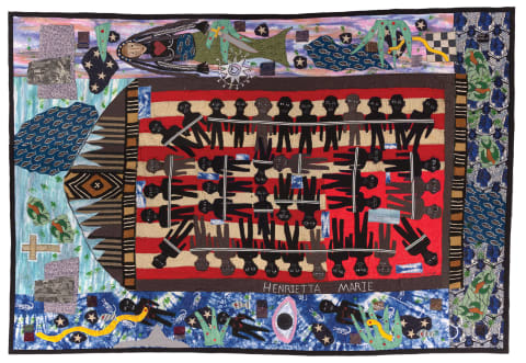 large quilt depicting Slave Ship Henrietta Marie
