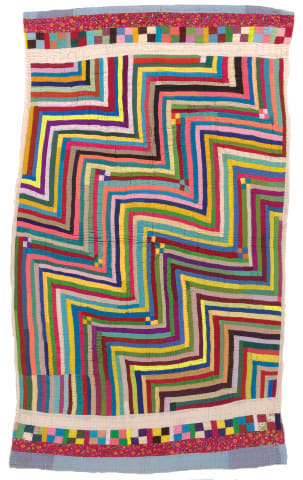 multicolored ralli quilt made by Permaben Maheshwari Dangera in India
